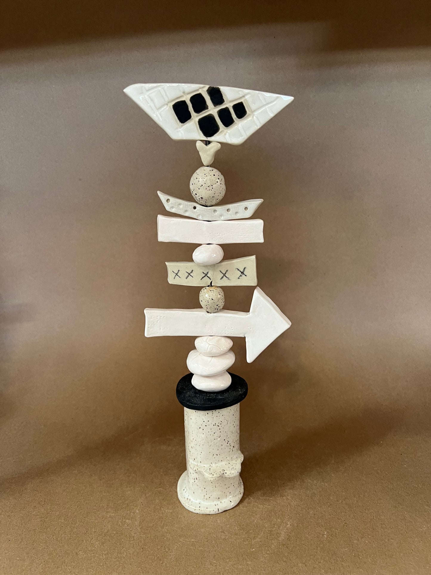 Totem arrow scale rocks kisses heart