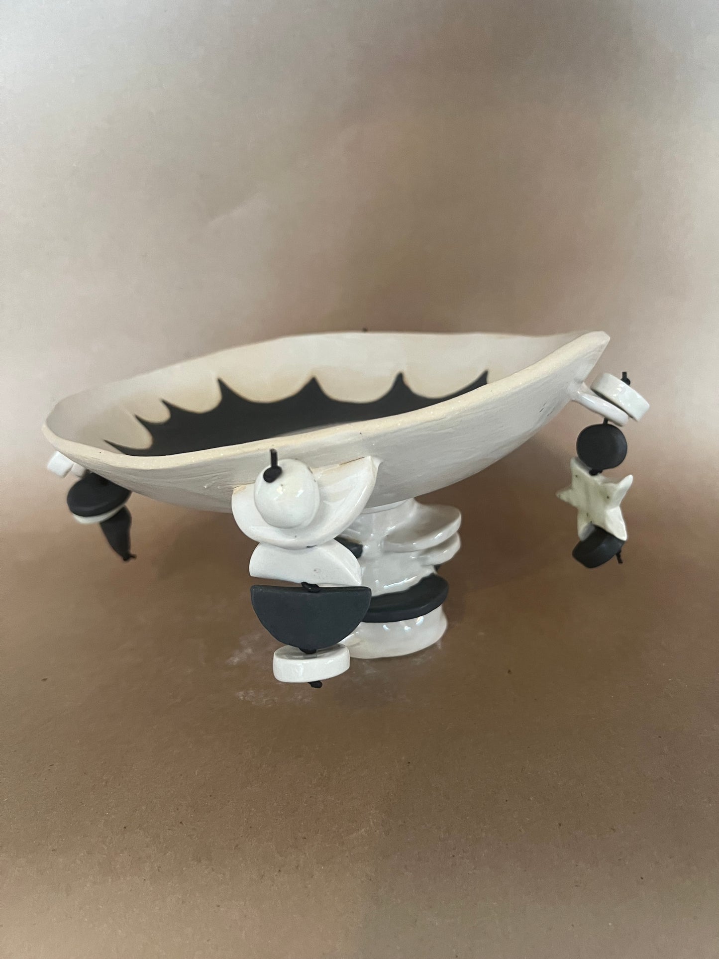 Sun footed dangle bowl 1