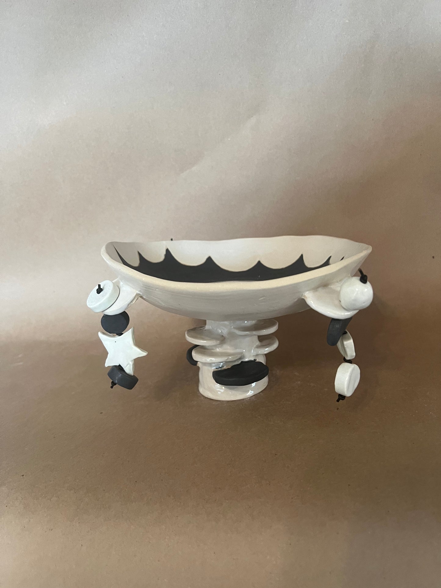 Sun footed dangle bowl 1
