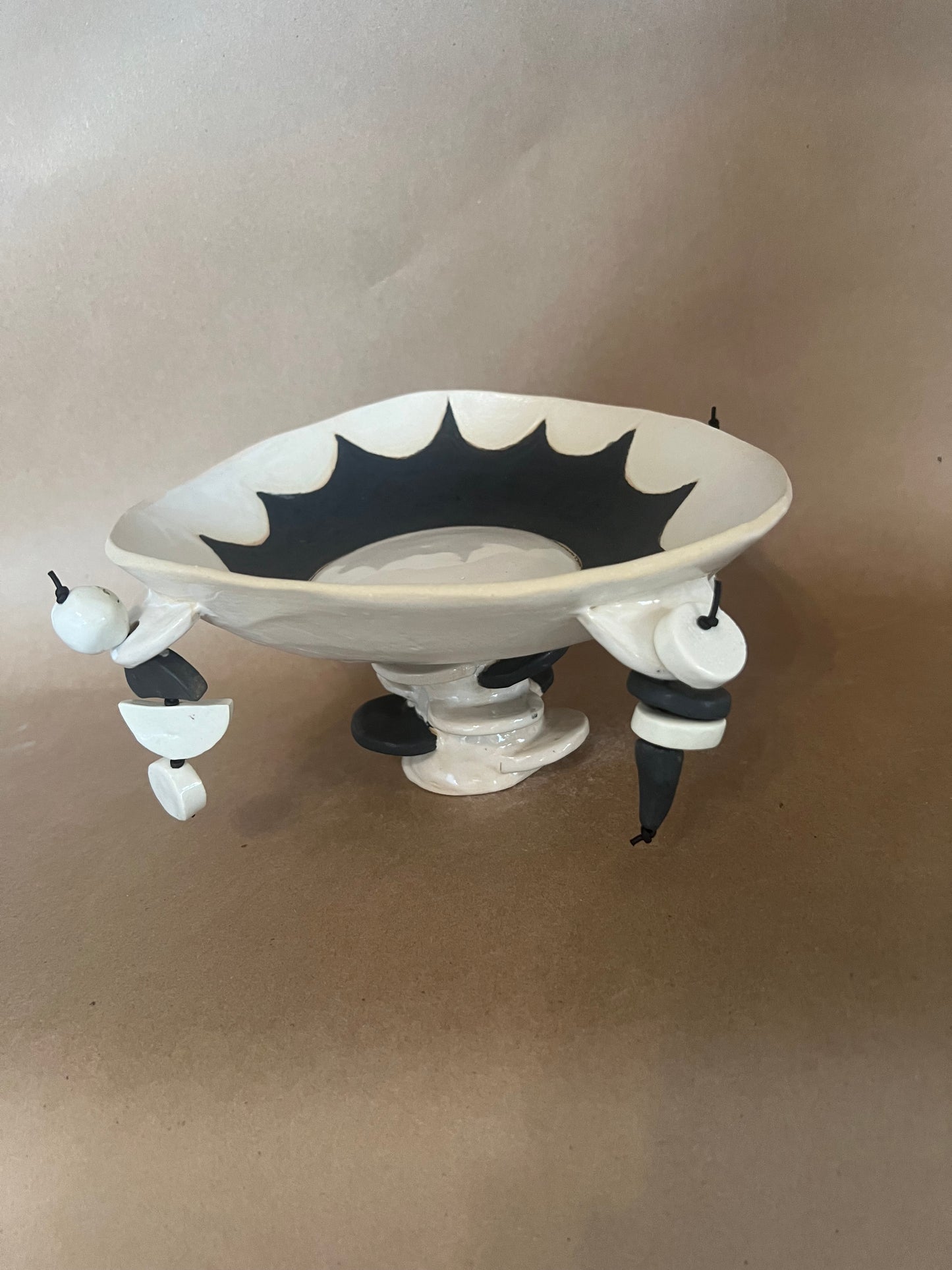 Sun footed dangle bowl 1