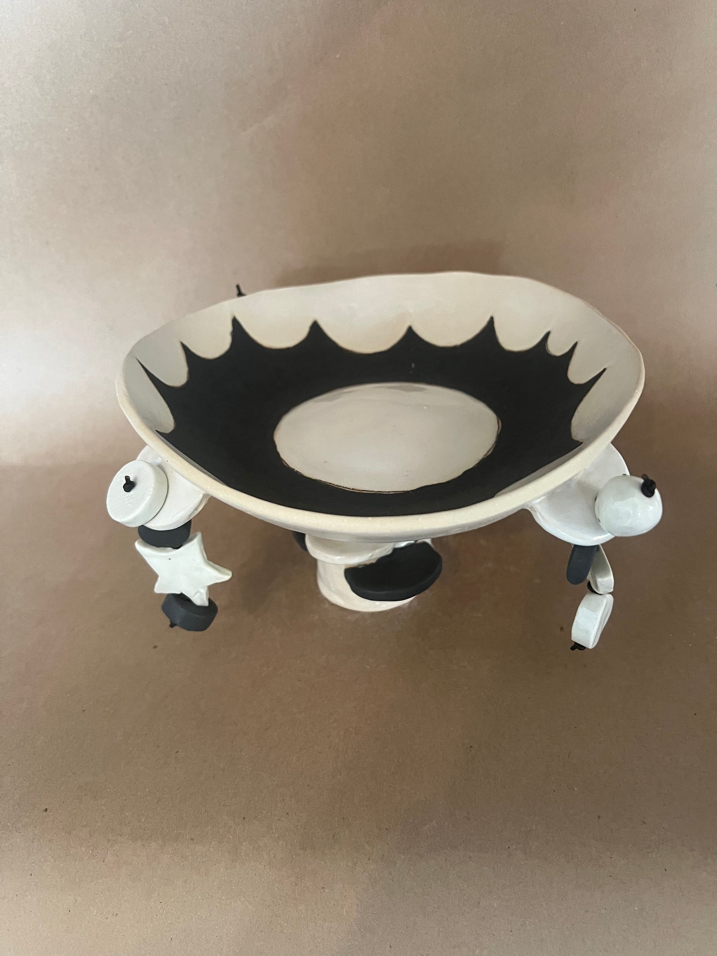 Sun footed dangle bowl 1