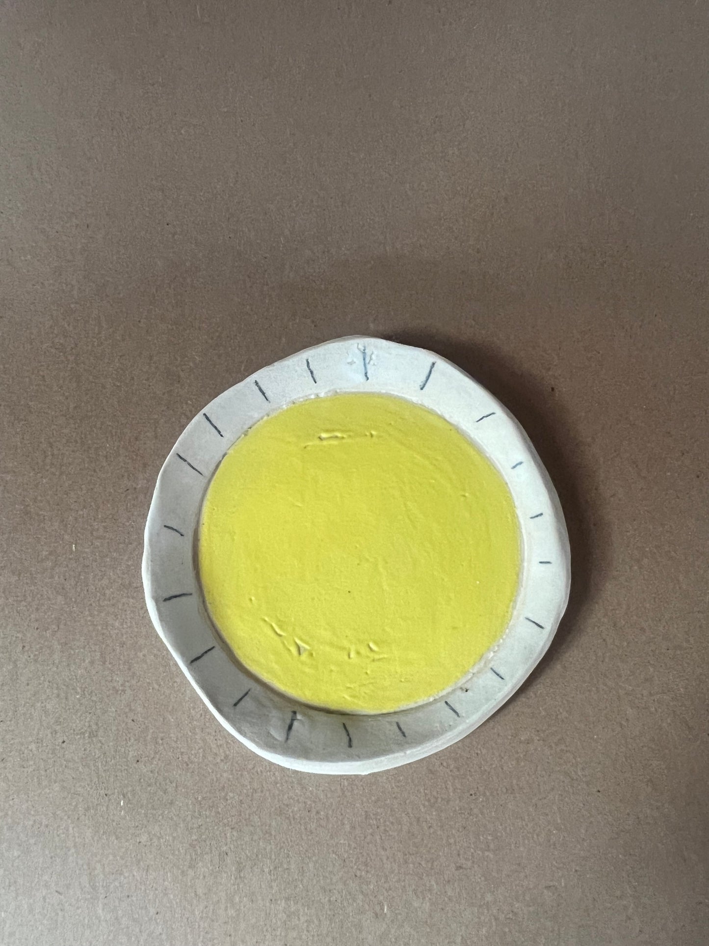 Yellow hole plate
