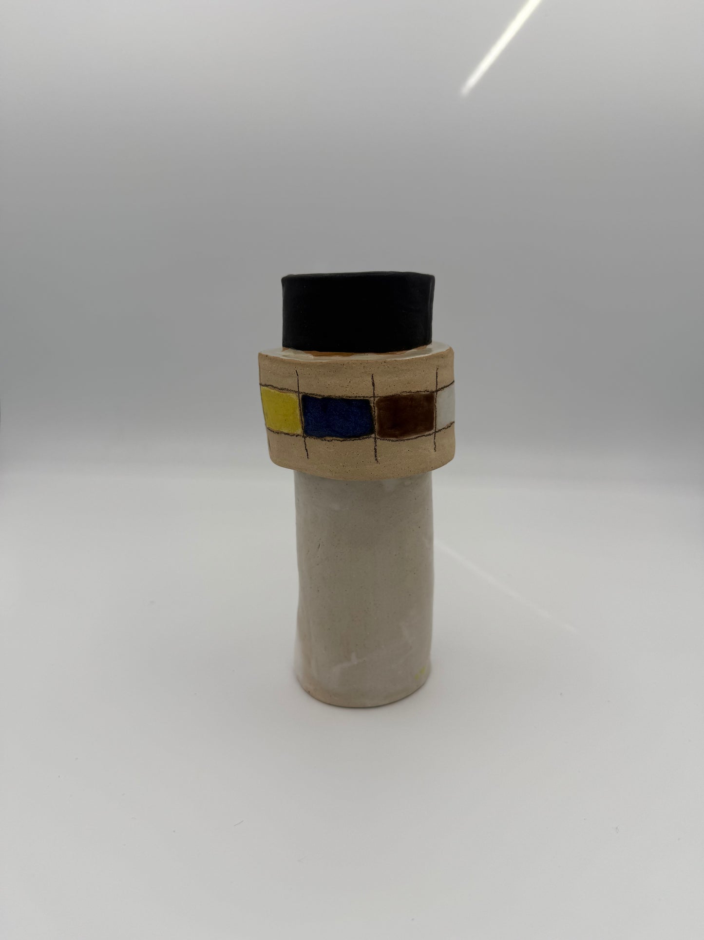 Checkered belted vase